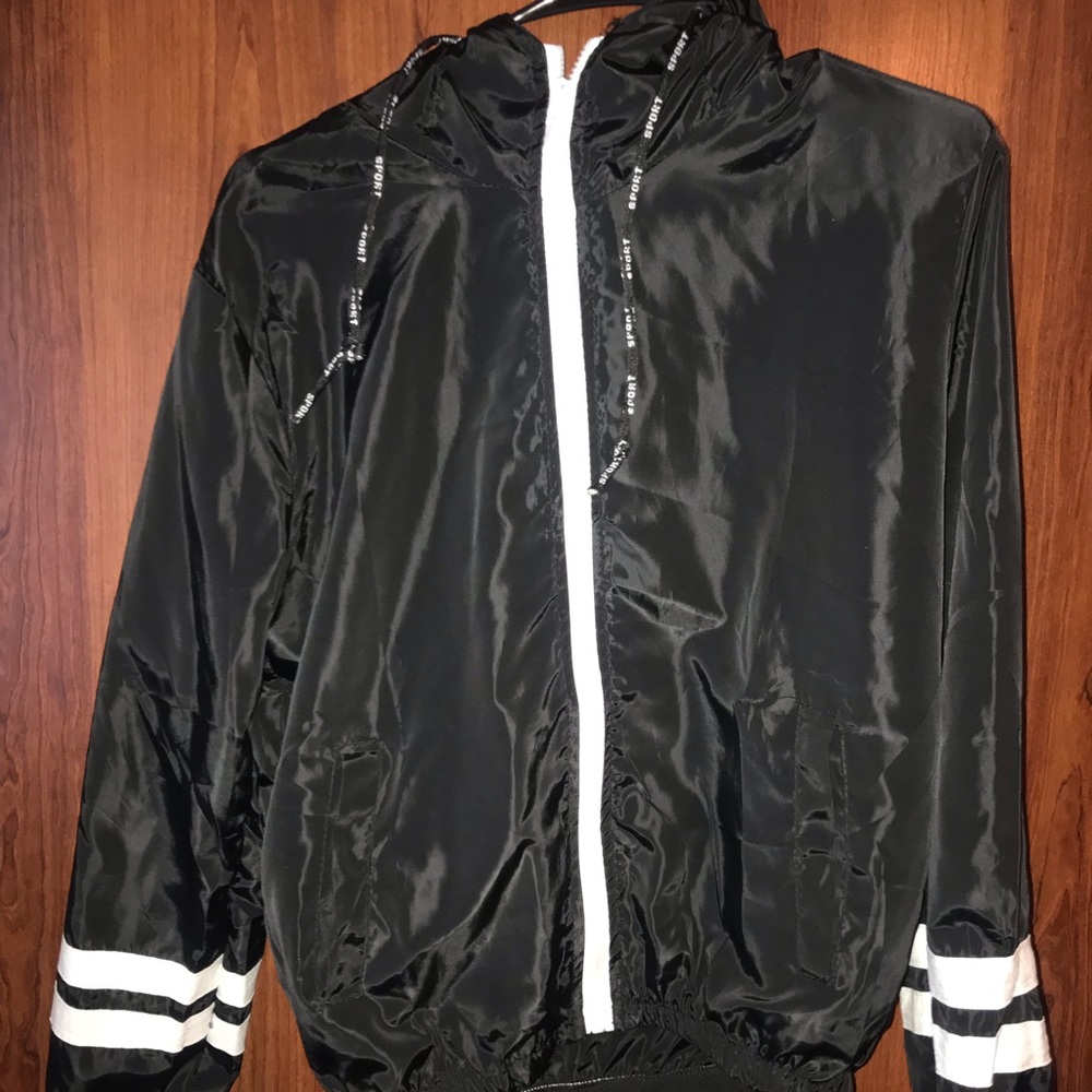 Black windbreaker